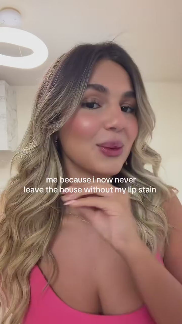 Creator applying and peeling the Trop Lip Stain Masque, video 3