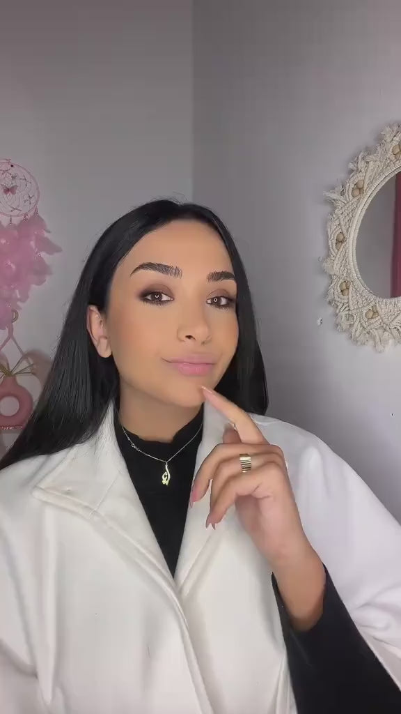 Creator applying and peeling the Trop Lip Stain Masque, video 6