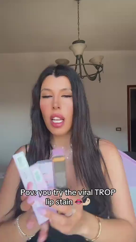 Creator applying and peeling the Trop Lip Stain Masque, video 2