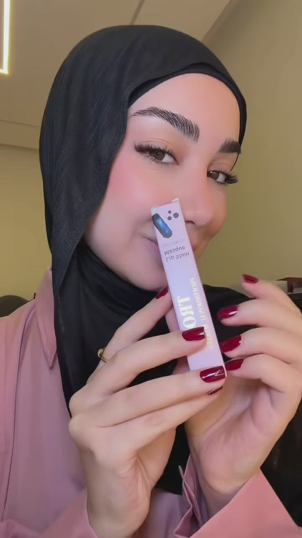 Creator applying and peeling the Trop Lip Stain Masque, video 5